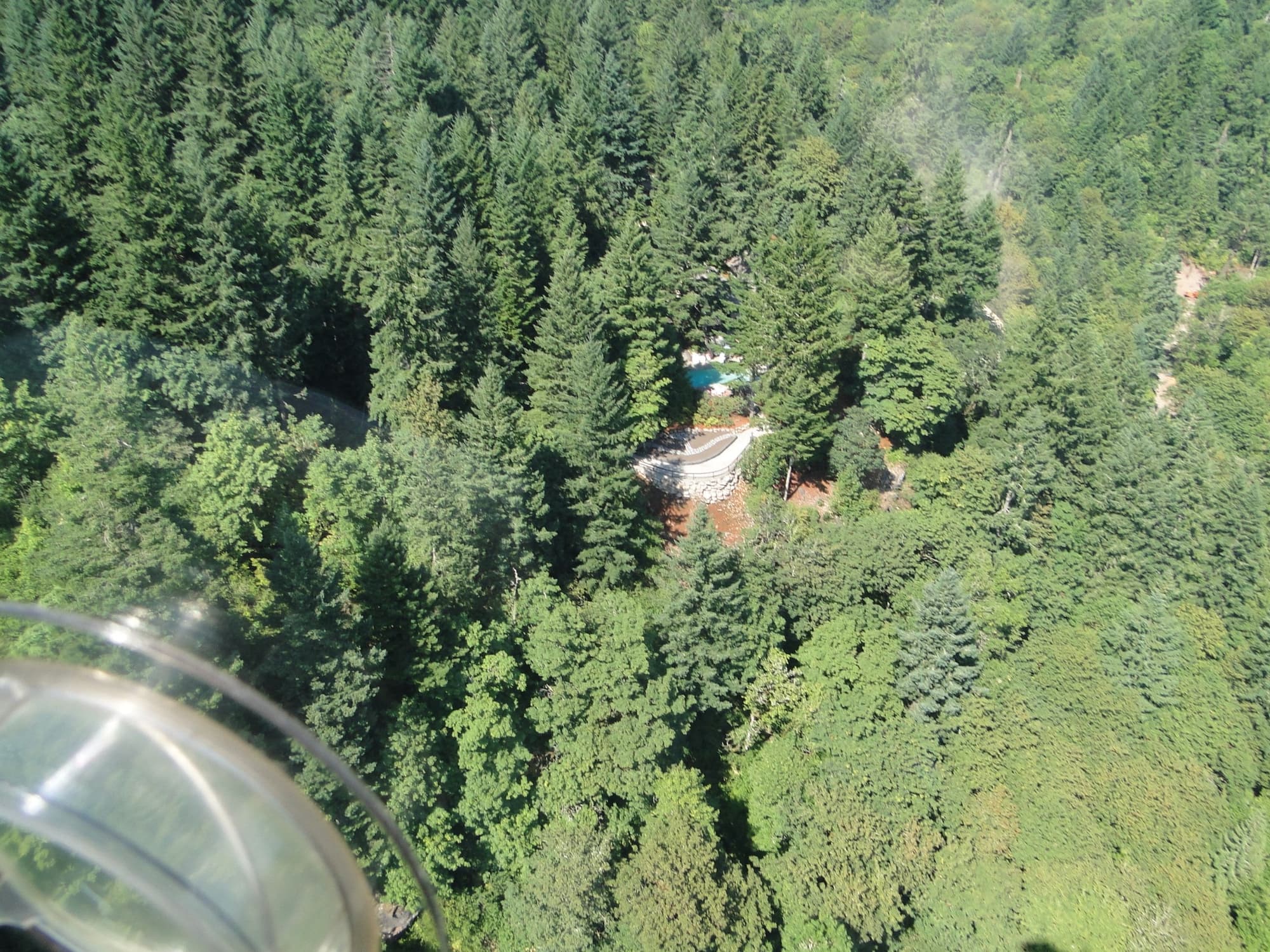 Aerial forest pool helicopter