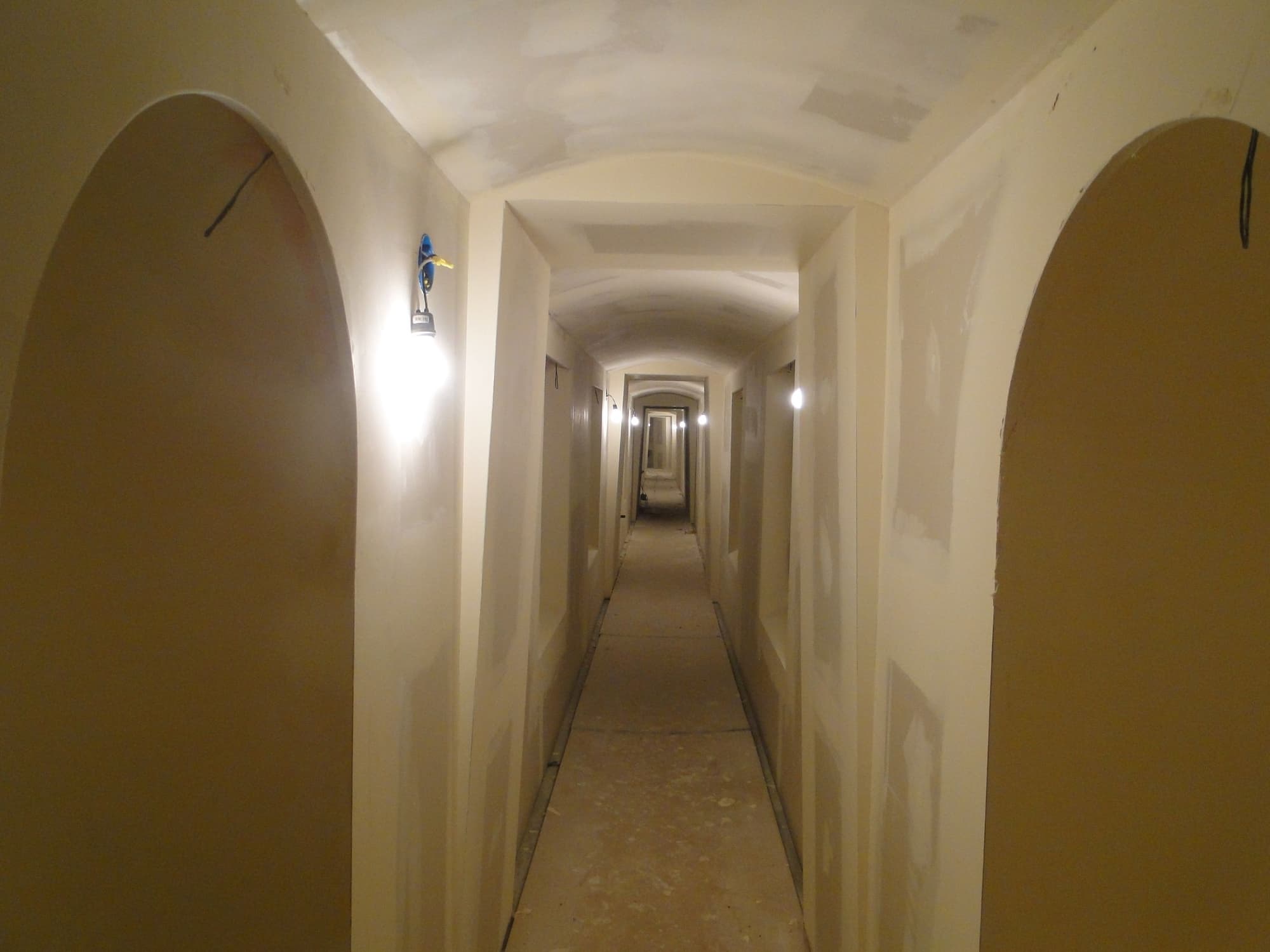 Arched openings corridor drywall