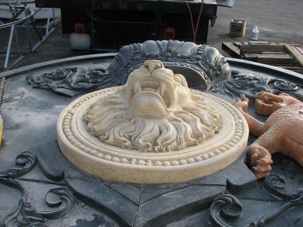 Carved lion head medallion