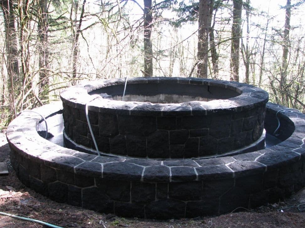 Circular stone fountain basin