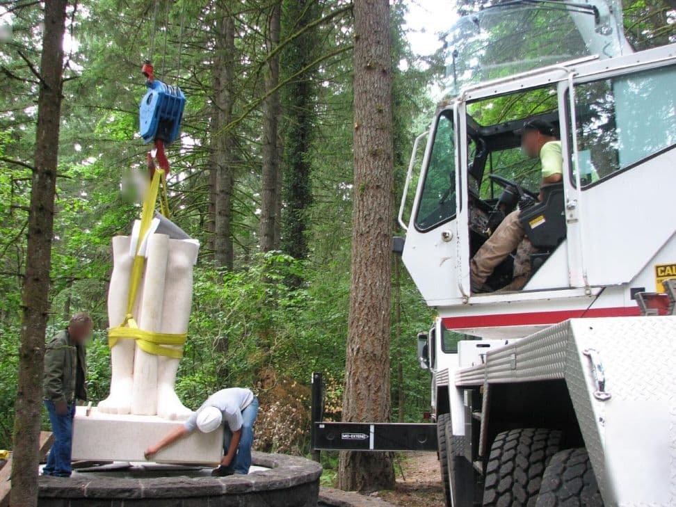 Crane operator statue legs