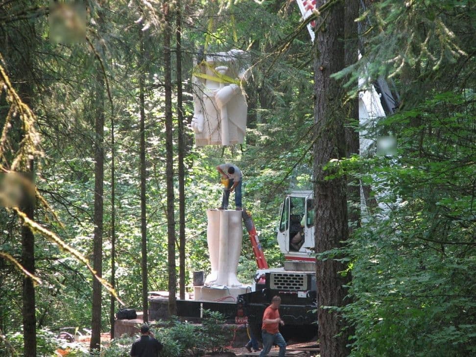 Crane statue installation forest