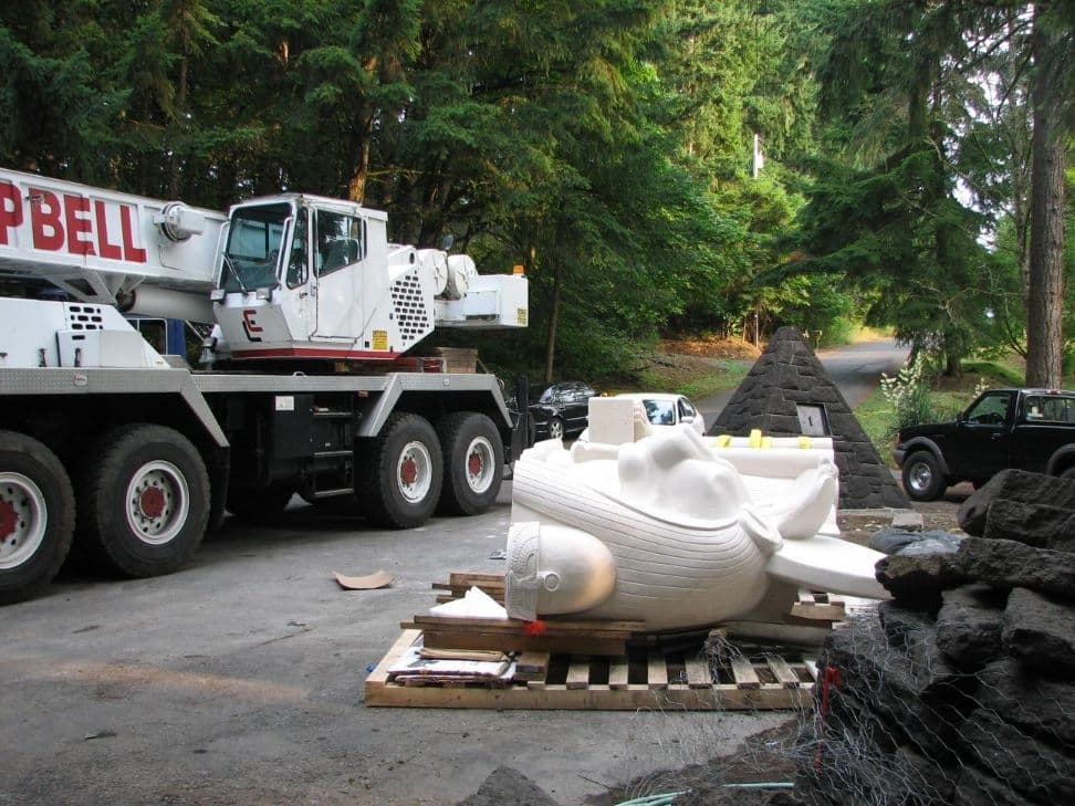 Crane truck statue head pyramid