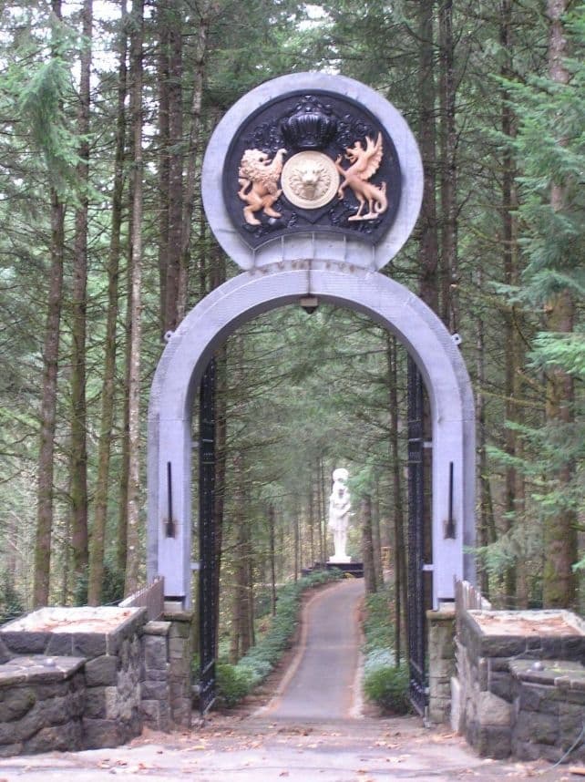Crest archway forest driveway