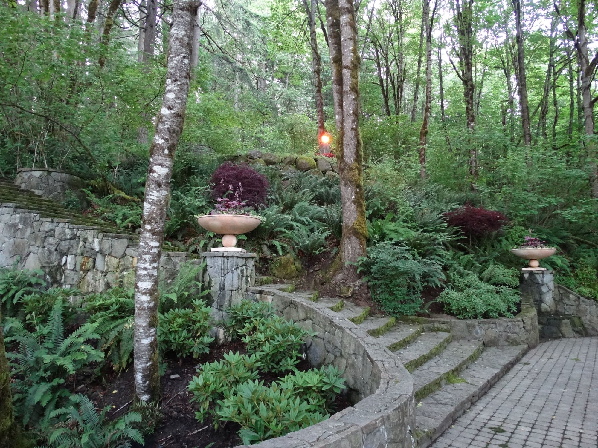 Curved steps urns torch