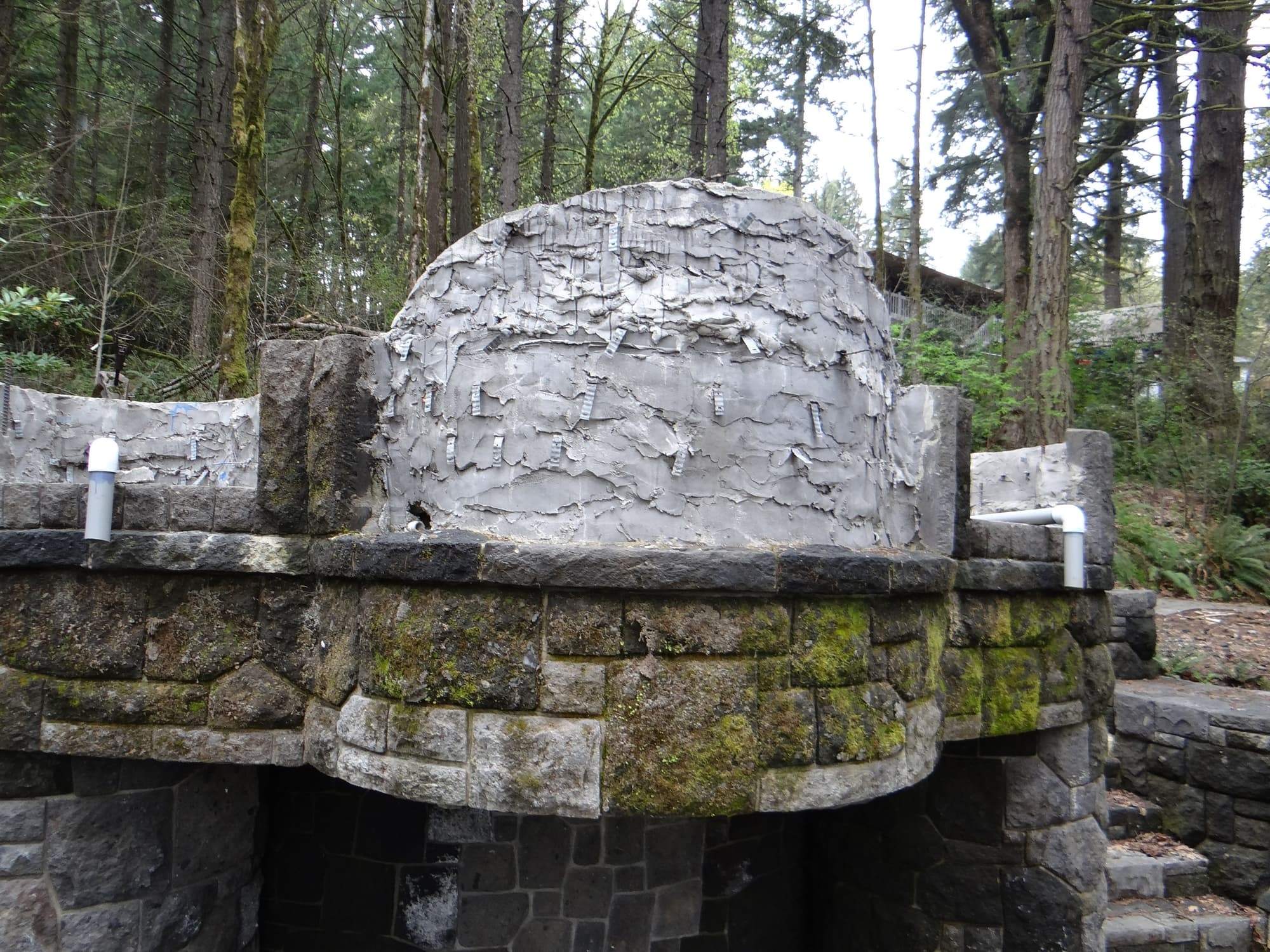 Domed stone fireplace construction