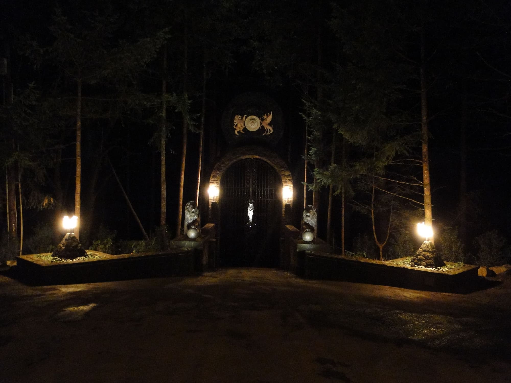Lit gate entrance night
