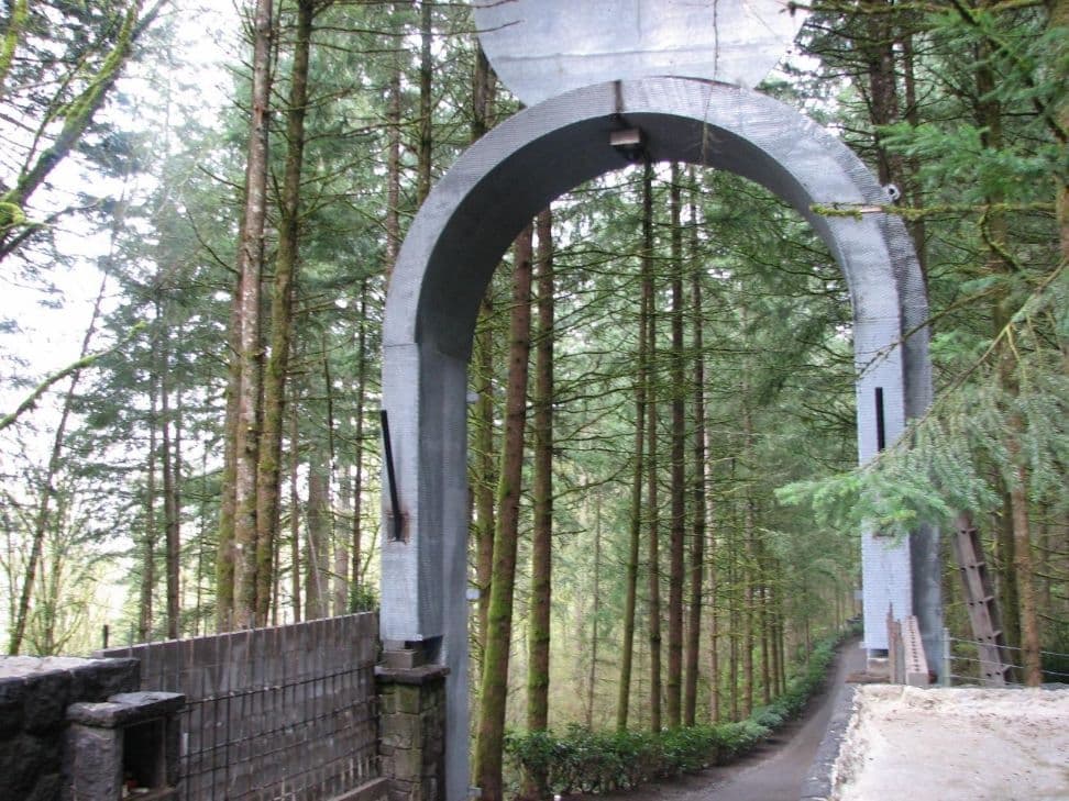Metal archway forest road