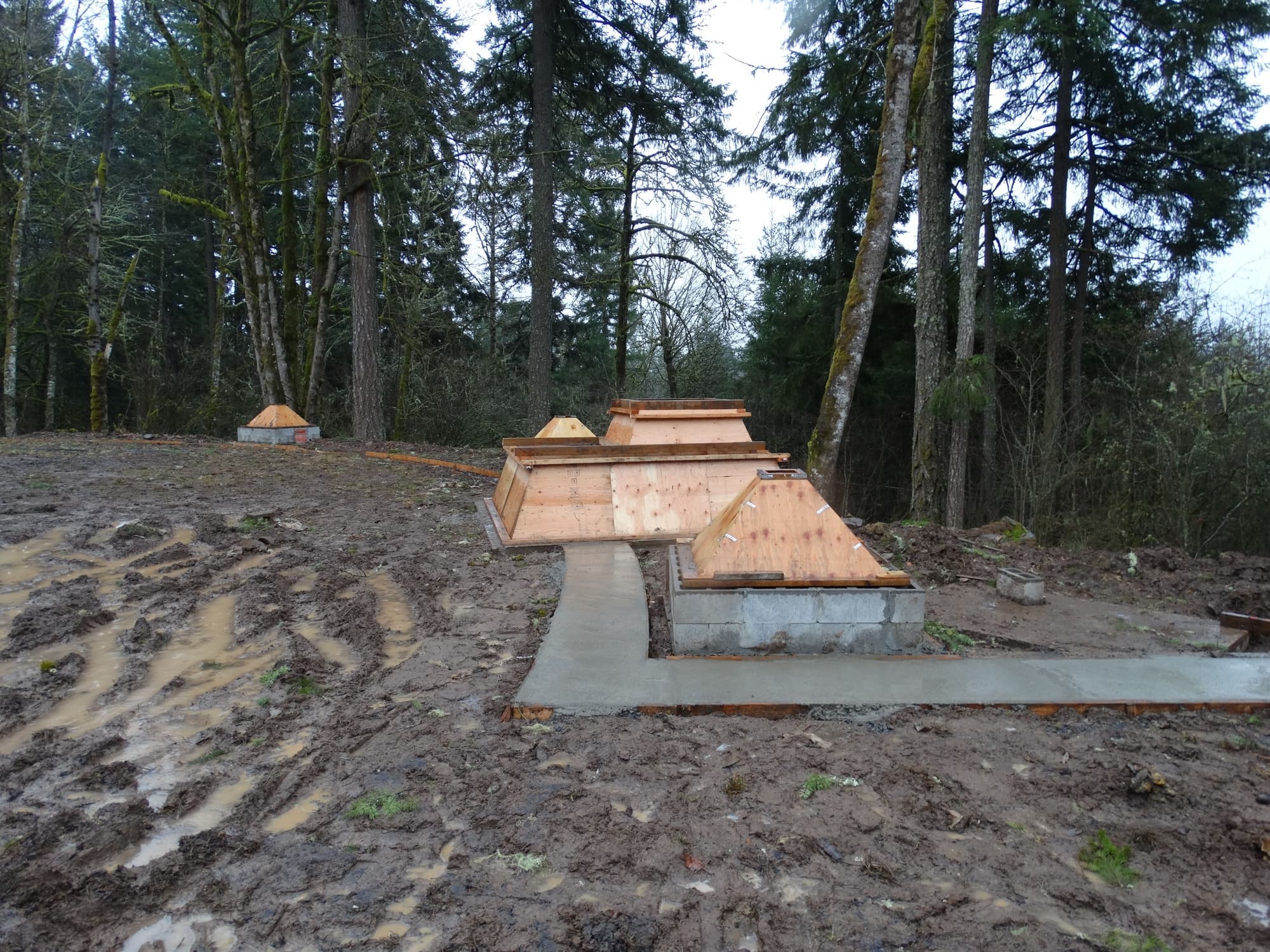 Plywood pyramids concrete walkway