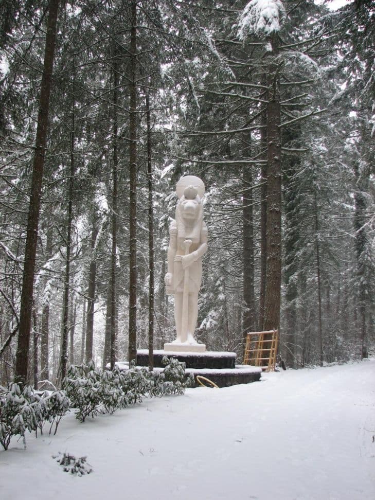 Sekhmet statue snowy forest