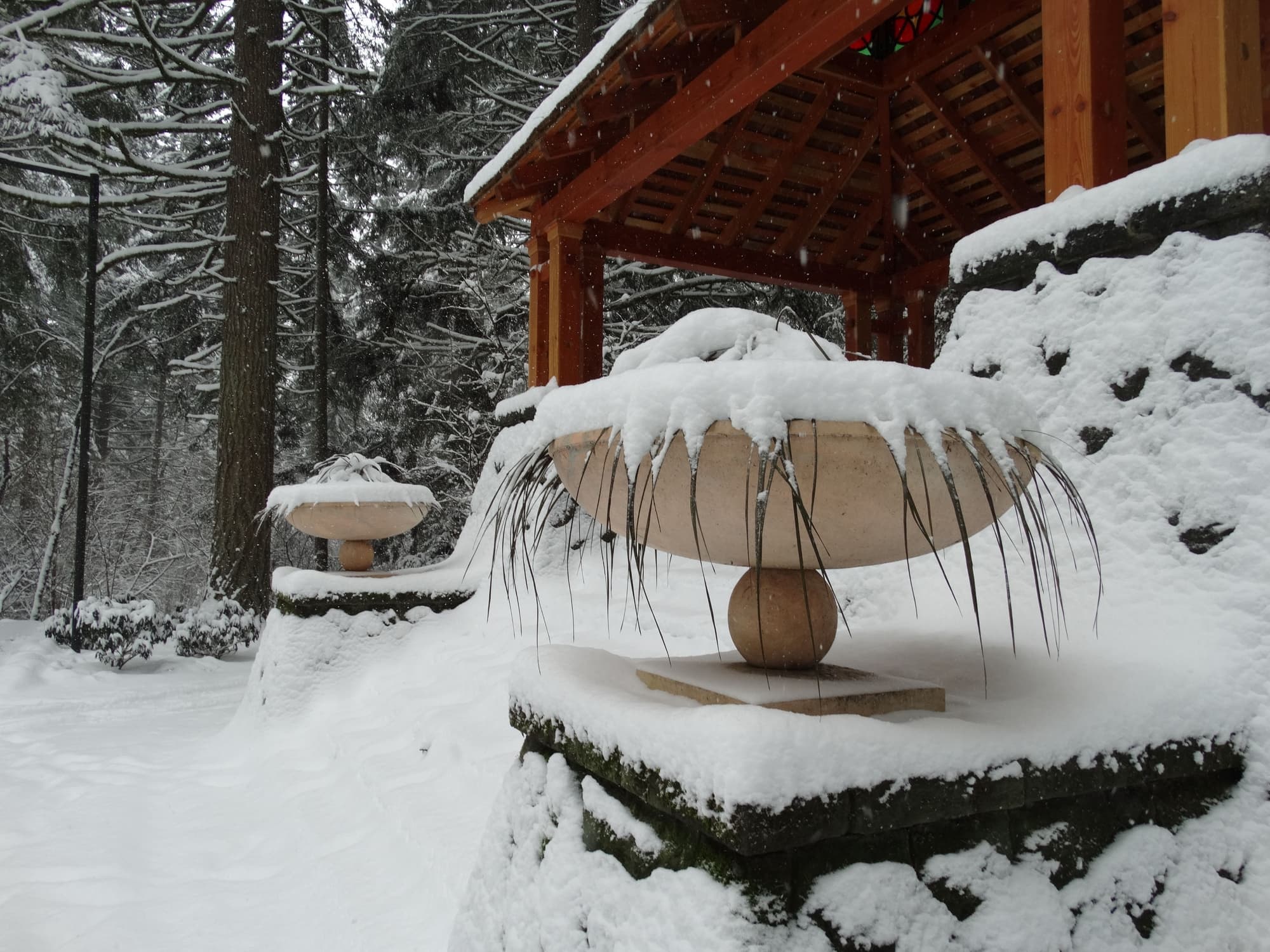 Snowy gazebo stone urns