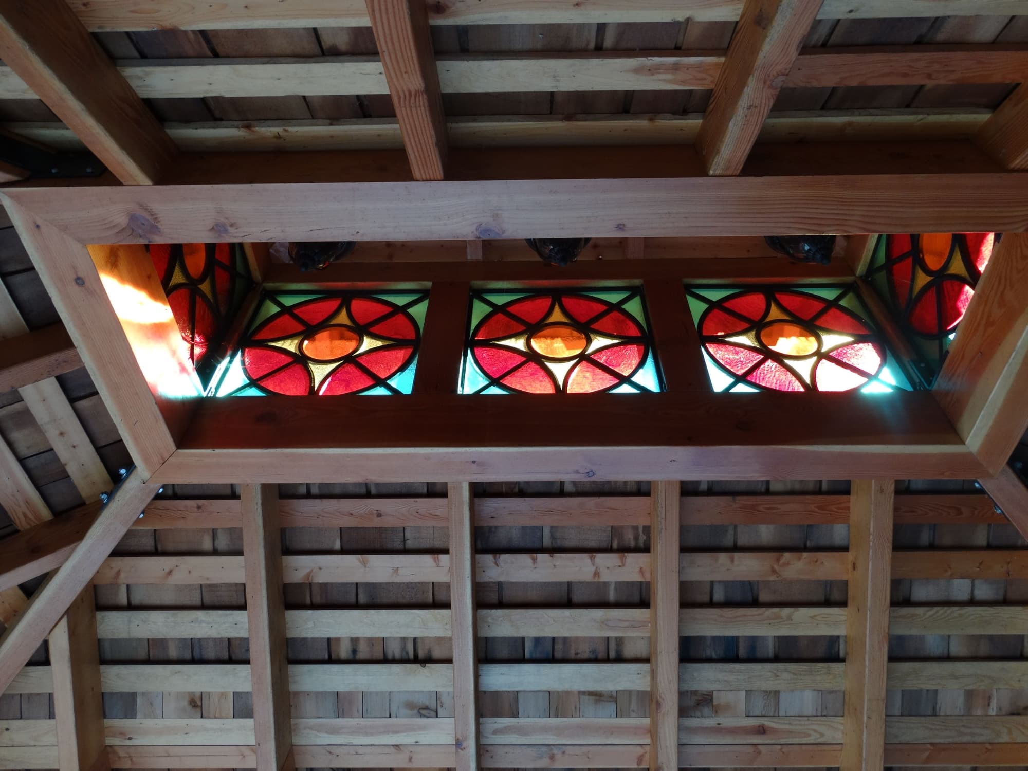 Stained glass clerestory wood ceiling
