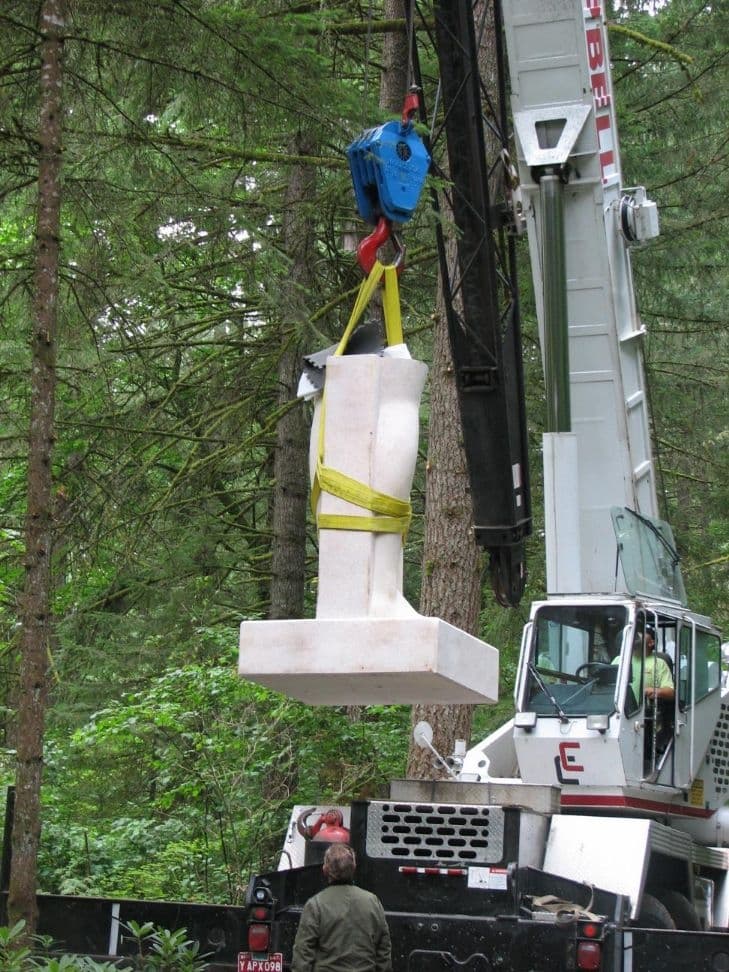 Statue leg hanging crane hook