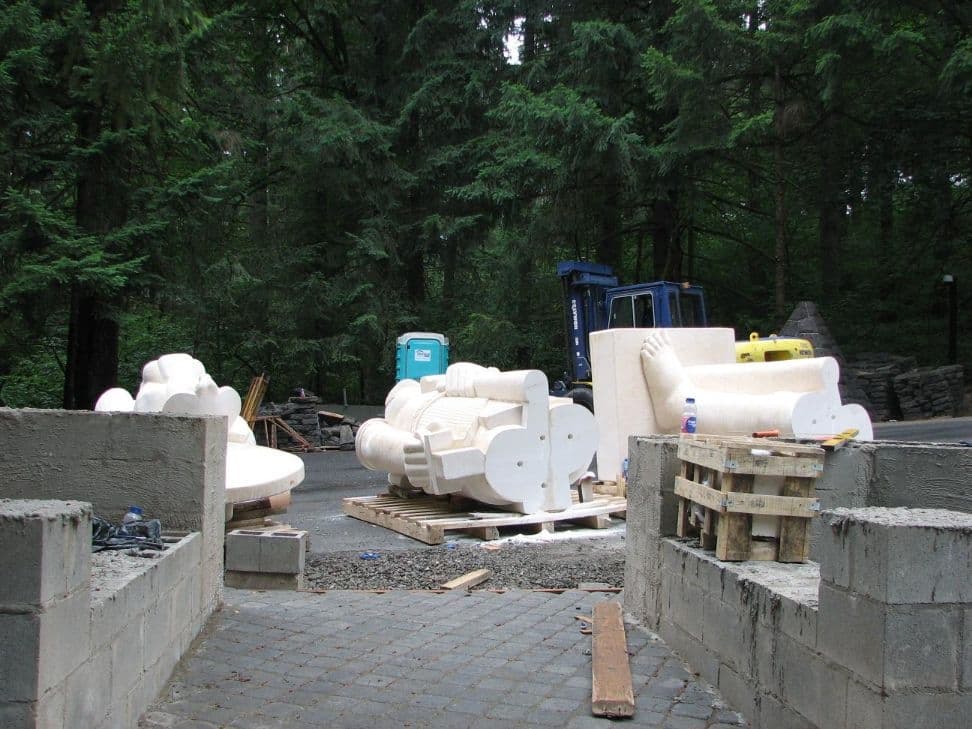 Statue parts block wall yard
