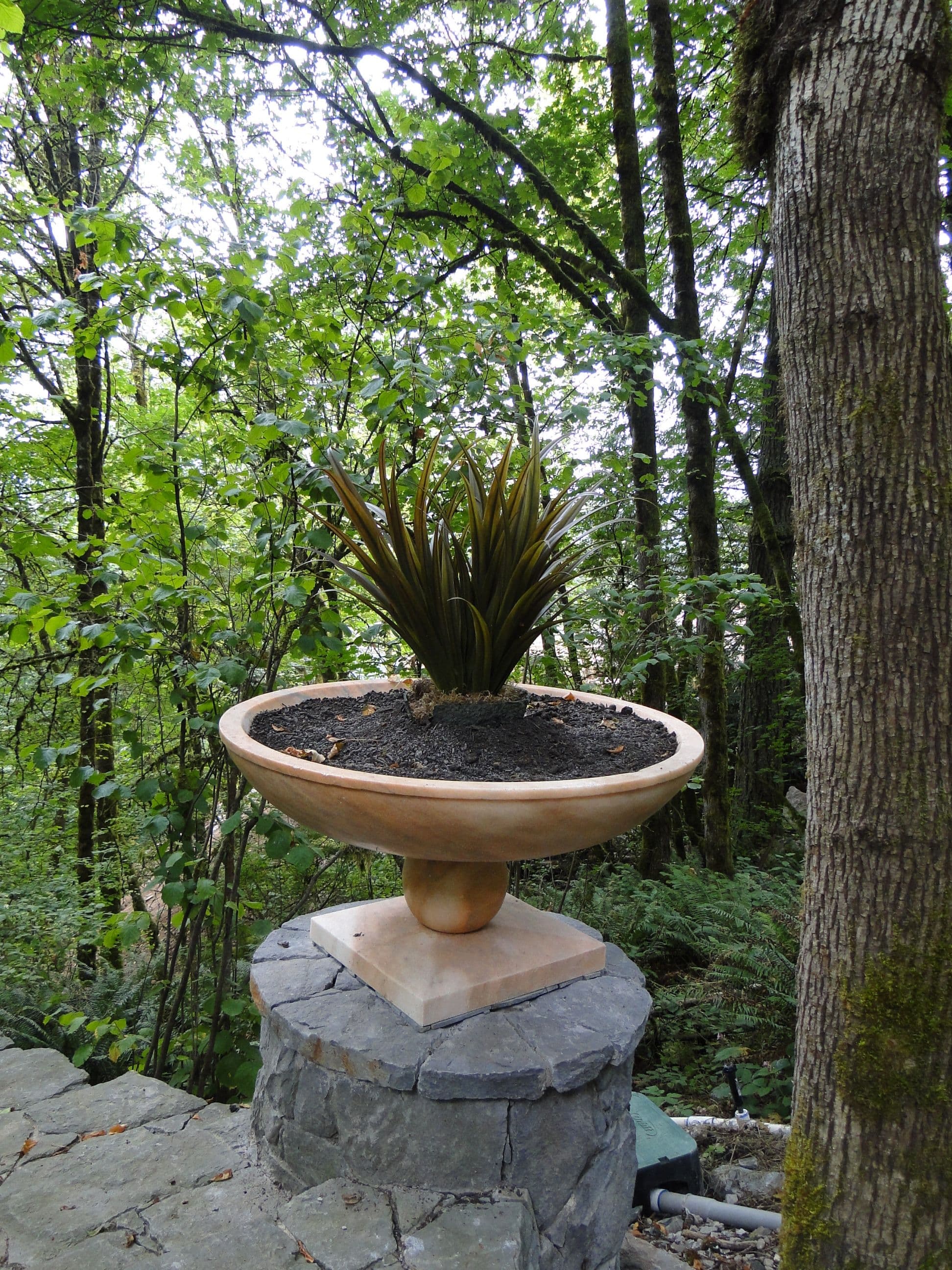 Stone pedestal planter bowl
