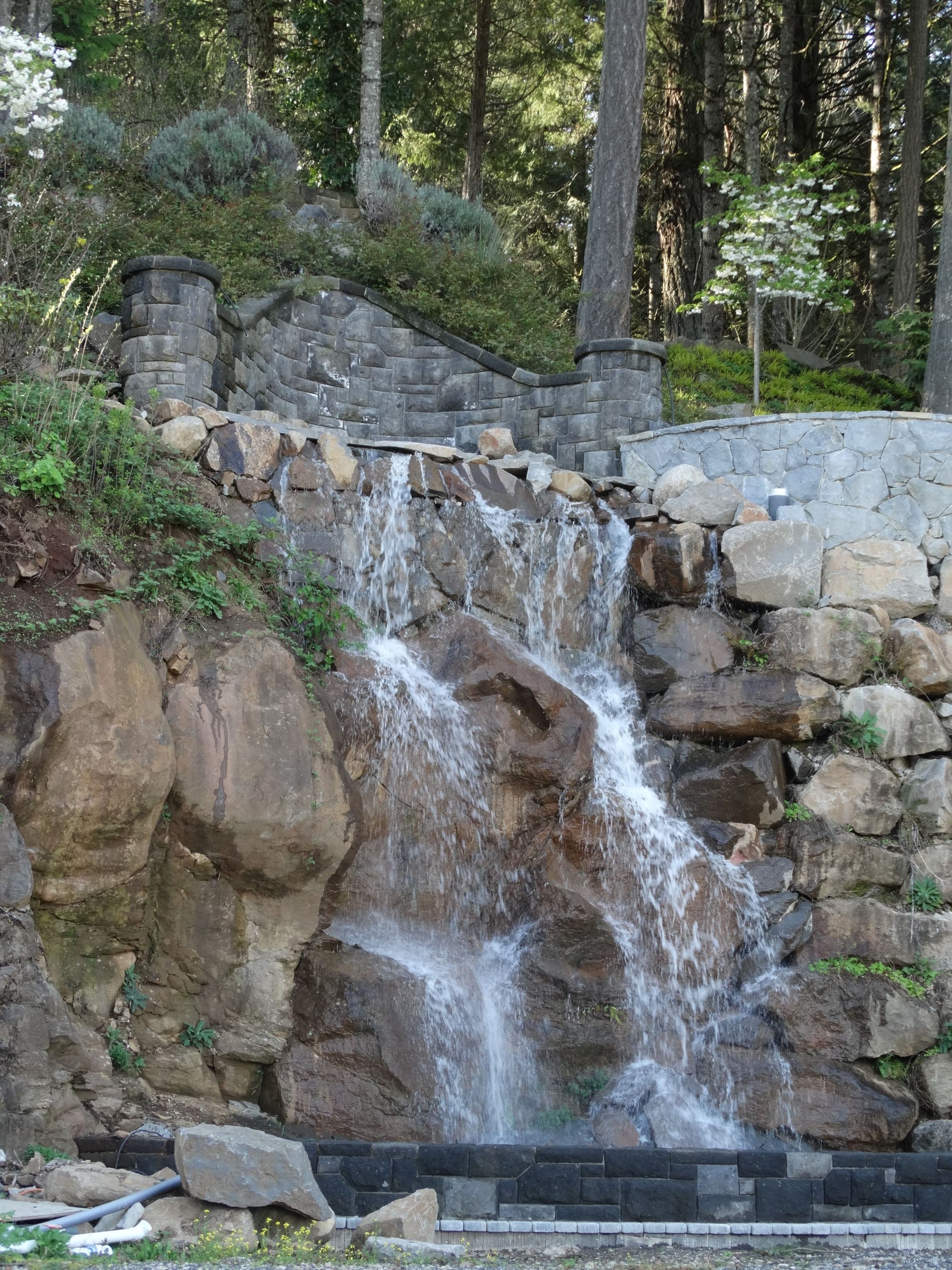 Waterfall stone retaining wall