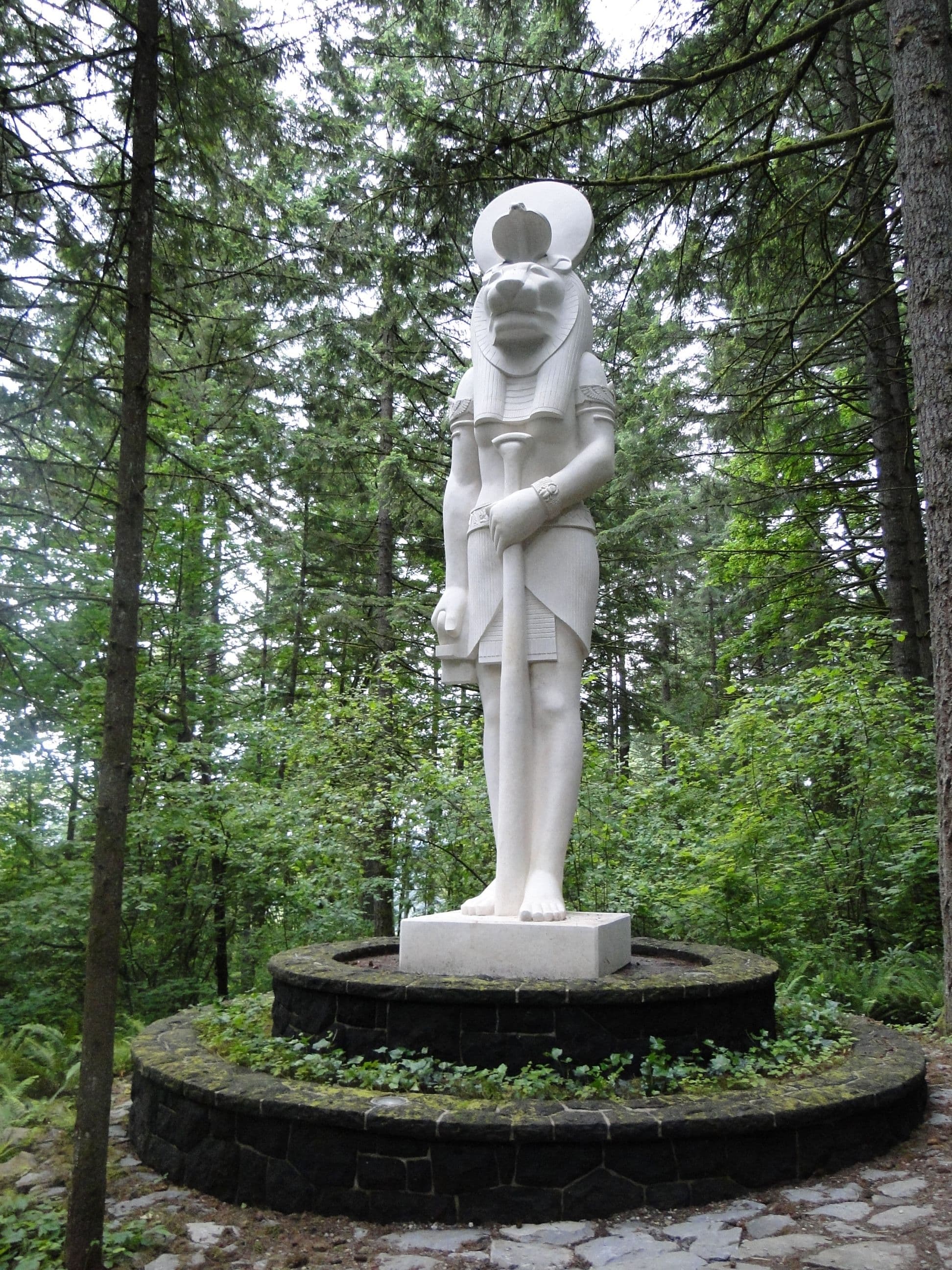 White sekhmet statue pedestal